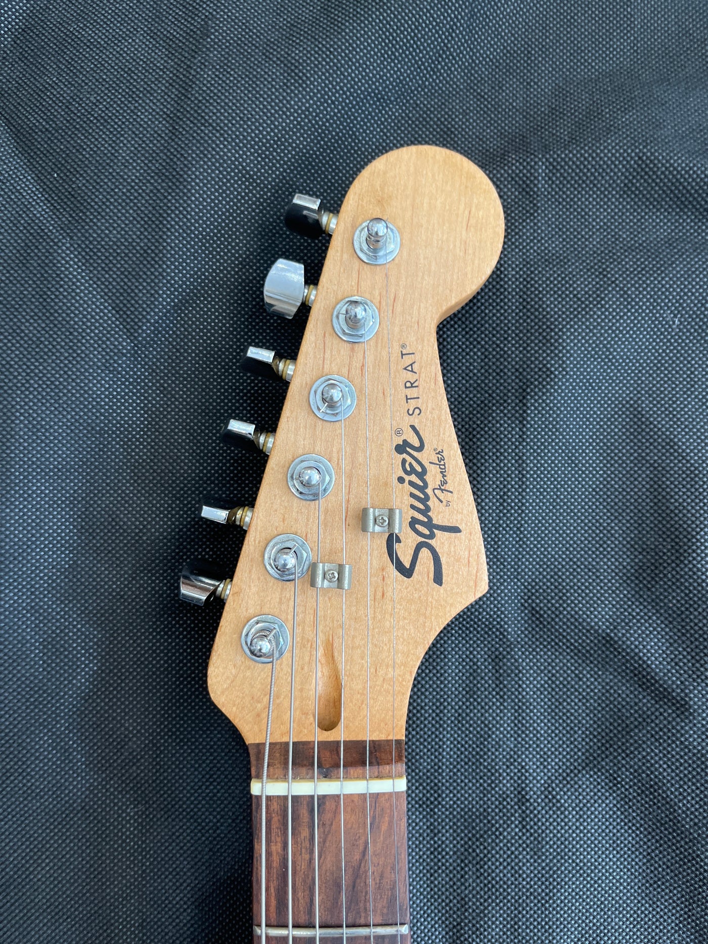 Early Squier stratocaster, Pearloid scratchplate, Black, Used - FF59E