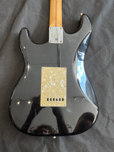 Early Squier stratocaster, Pearloid scratchplate, Black, Used - FF59E