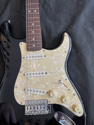 Early Squier stratocaster, Pearloid scratchplate, Black, Used - FF59E
